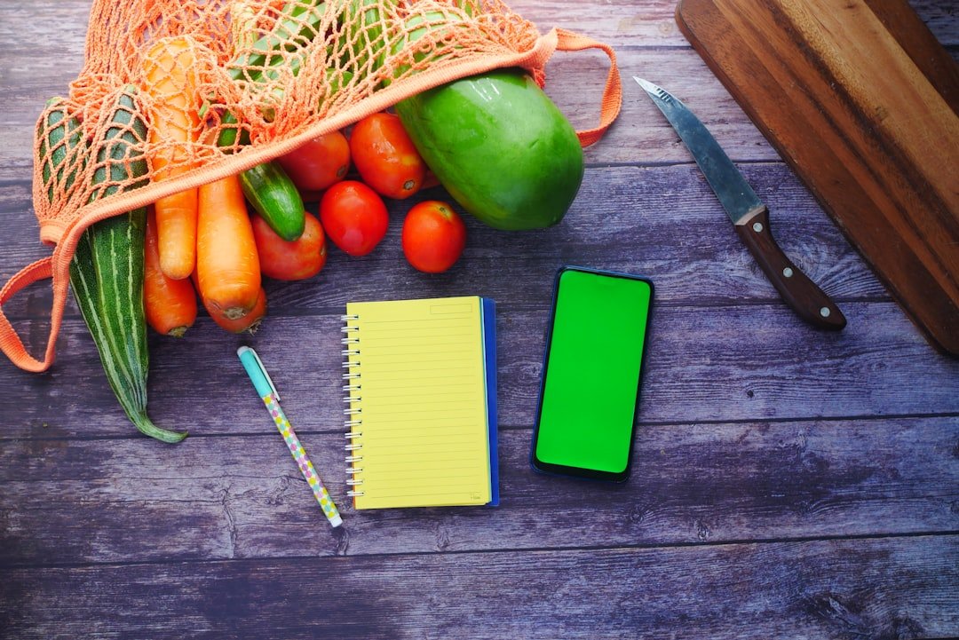 fresh vegetables and meal planning notes on a table